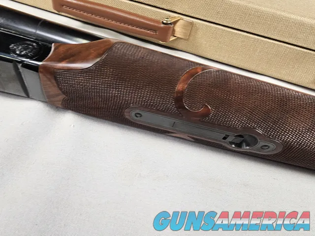 9111  Classic Doubles 12 gauge, 26 “ Barrels, IC/MOD, AA++ Marbled Walnut, Butt pad, vent rib, ejectors, Pistol grip with cap