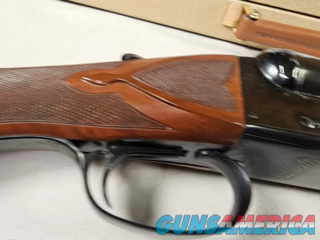 9111  Classic Doubles 12 gauge, 26 “ Barrels, IC/MOD, AA++ Marbled Walnut, Butt pad, vent rib, ejectors, Pistol grip with cap