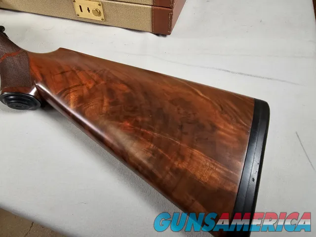 9111  Classic Doubles 12 gauge, 26 “ Barrels, IC/MOD, AA++ Marbled Walnut, Butt pad, vent rib, ejectors, Pistol grip with cap