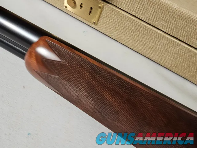 9111  Classic Doubles 12 gauge, 26 “ Barrels, IC/MOD, AA++ Marbled Walnut, Butt pad, vent rib, ejectors, Pistol grip with cap
