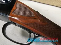 9111  Classic Doubles 12 gauge, 26 “ Barrels, IC/MOD, AA++ Marbled Walnut, Butt pad, vent rib, ejectors, Pistol grip with cap