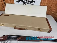 9111  Classic Doubles 12 gauge, 26 “ Barrels, IC/MOD, AA++ Marbled Walnut, Butt pad, vent rib, ejectors, Pistol grip with cap