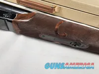 9111  Classic Doubles 12 gauge, 26 “ Barrels, IC/MOD, AA++ Marbled Walnut, Butt pad, vent rib, ejectors, Pistol grip with cap