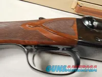 9111  Classic Doubles 12 gauge, 26 “ Barrels, IC/MOD, AA++ Marbled Walnut, Butt pad, vent rib, ejectors, Pistol grip with cap