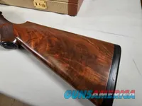 9111  Classic Doubles 12 gauge, 26 “ Barrels, IC/MOD, AA++ Marbled Walnut, Butt pad, vent rib, ejectors, Pistol grip with cap