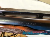 9111  Classic Doubles 12 gauge, 26 “ Barrels, IC/MOD, AA++ Marbled Walnut, Butt pad, vent rib, ejectors, Pistol grip with cap
