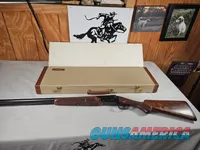 9111  Classic Doubles 12 gauge, 26 “ Barrels, IC/MOD, AA++ Marbled Walnut, Butt pad, vent rib, ejectors, Pistol grip with cap