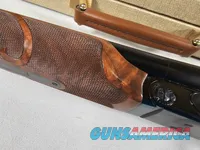9111  Classic Doubles 12 gauge, 26 “ Barrels, IC/MOD, AA++ Marbled Walnut, Butt pad, vent rib, ejectors, Pistol grip with cap