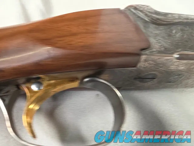 9269  Ithaca/ SKB  600 20 gauge, 26” barrels, M/F, single selective gold trigger, pistol grip with cap, butt plate, ejectors,
