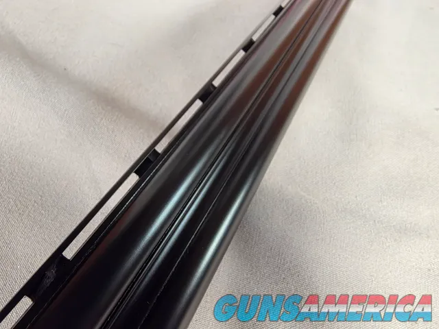 9269  Ithaca/ SKB  600 20 gauge, 26” barrels, M/F, single selective gold trigger, pistol grip with cap, butt plate, ejectors,
