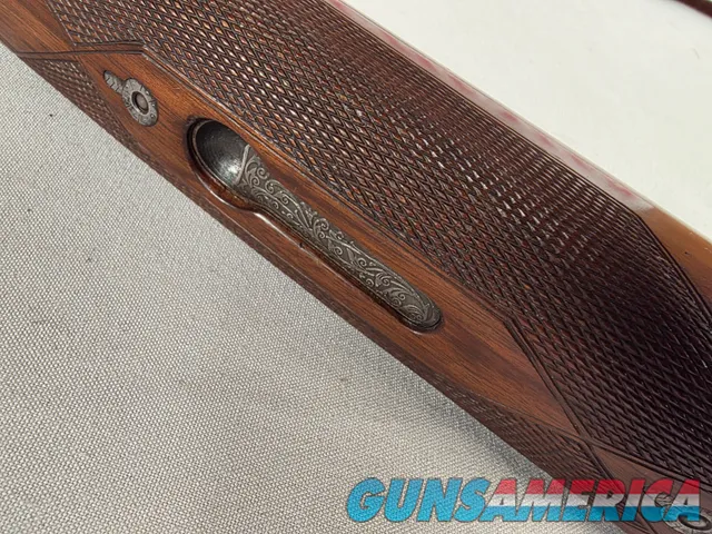 9269  Ithaca/ SKB  600 20 gauge, 26” barrels, M/F, single selective gold trigger, pistol grip with cap, butt plate, ejectors,