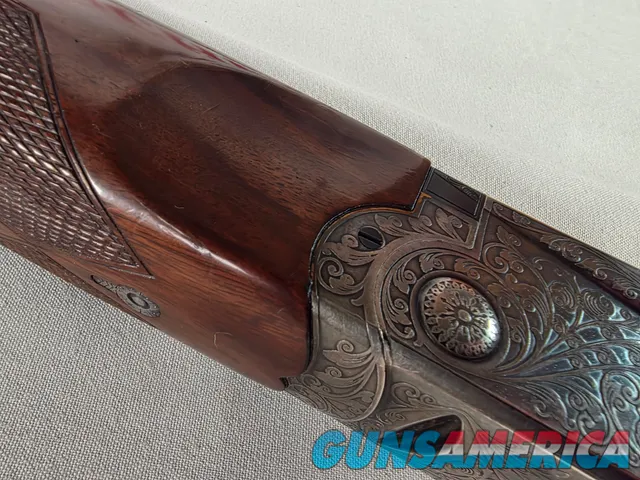 9269  Ithaca/ SKB  600 20 gauge, 26” barrels, M/F, single selective gold trigger, pistol grip with cap, butt plate, ejectors,