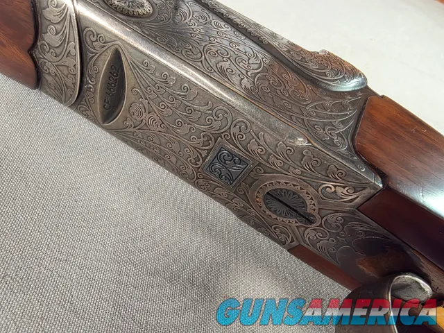9269  Ithaca/ SKB  600 20 gauge, 26” barrels, M/F, single selective gold trigger, pistol grip with cap, butt plate, ejectors,