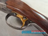 9269  Ithaca/ SKB  600 20 gauge, 26” barrels, M/F, single selective gold trigger, pistol grip with cap, butt plate, ejectors,