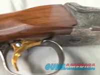 9269  Ithaca/ SKB  600 20 gauge, 26” barrels, M/F, single selective gold trigger, pistol grip with cap, butt plate, ejectors,