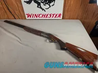 9269  Ithaca/ SKB  600 20 gauge, 26” barrels, M/F, single selective gold trigger, pistol grip with cap, butt plate, ejectors,