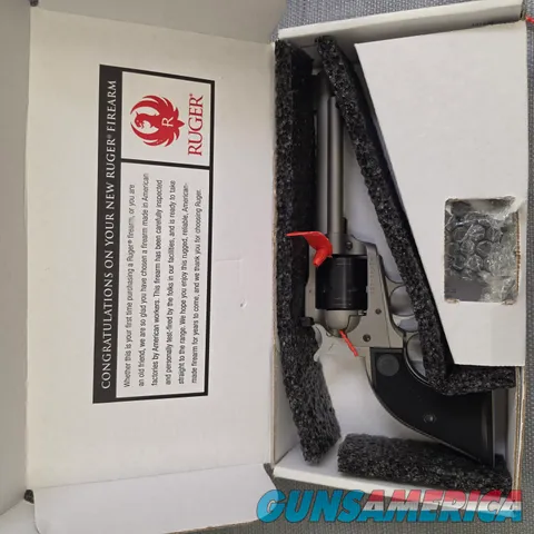 Ruger Super Wrangler 5-1/2 in 6 Shot Revolver Silver CKT .22lr & WINMAG Cyl.