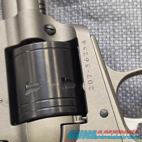 Ruger Super Wrangler 5-1/2 in 6 Shot Revolver Silver CKT .22lr & WINMAG Cyl.