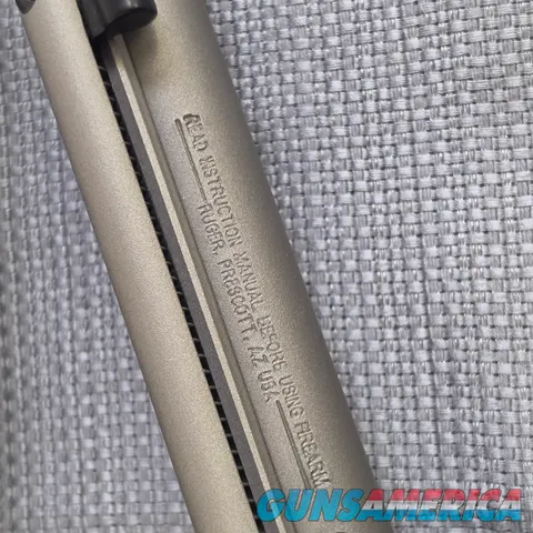 Ruger Super Wrangler 5-1/2 in 6 Shot Revolver Silver CKT .22lr & WINMAG Cyl.