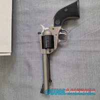 Ruger Super Wrangler 5-1/2 in 6 Shot Revolver Silver CKT .22lr & WINMAG Cyl.
