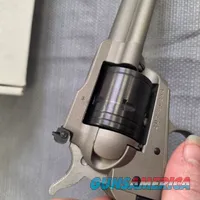 Ruger Super Wrangler 5-1/2 in 6 Shot Revolver Silver CKT .22lr & WINMAG Cyl.