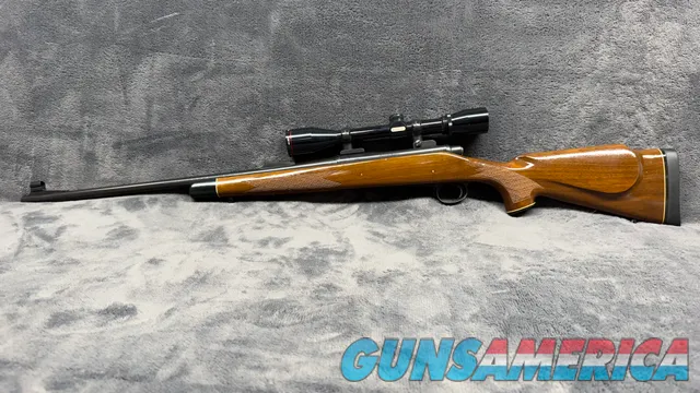 Classic Bolt-Action Hunting Rifle w/ Sco...