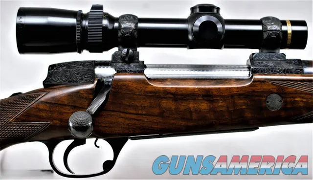 HOLLAND & HOLLAND DELUXE .375 MAGNUM MAGAZINE RIFLE WITH SCOPE