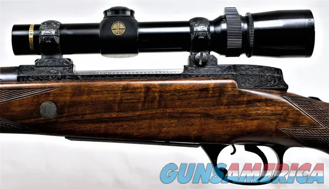 HOLLAND & HOLLAND DELUXE .375 MAGNUM MAGAZINE RIFLE WITH SCOPE