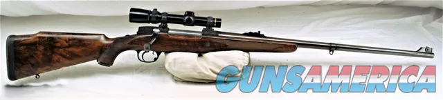 HOLLAND & HOLLAND DELUXE .375 MAGNUM MAGAZINE RIFLE WITH SCOPE