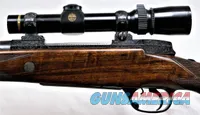 HOLLAND & HOLLAND DELUXE .375 MAGNUM MAGAZINE RIFLE WITH SCOPE
