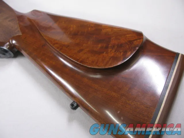 8123  Winchester Super grade 12 gauge over 222 Remington. Only 1000 ever produced