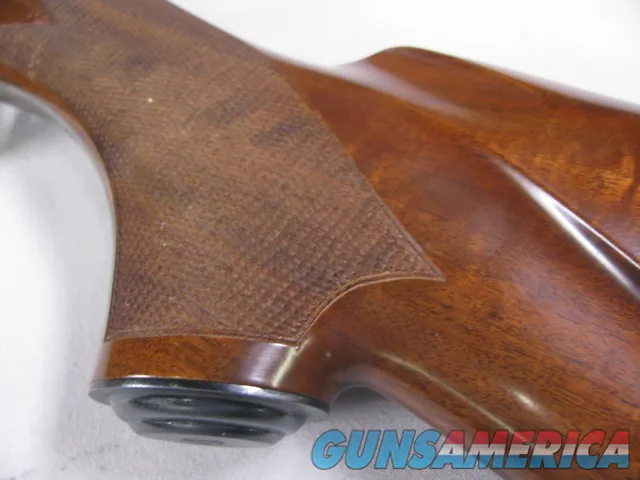 8123  Winchester Super grade 12 gauge over 222 Remington. Only 1000 ever produced
