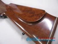 8123  Winchester Super grade 12 gauge over 222 Remington. Only 1000 ever produced