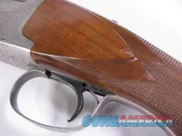 8123  Winchester Super grade 12 gauge over 222 Remington. Only 1000 ever produced