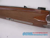 8123  Winchester Super grade 12 gauge over 222 Remington. Only 1000 ever produced
