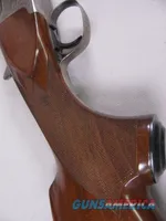 8123  Winchester Super grade 12 gauge over 222 Remington. Only 1000 ever produced
