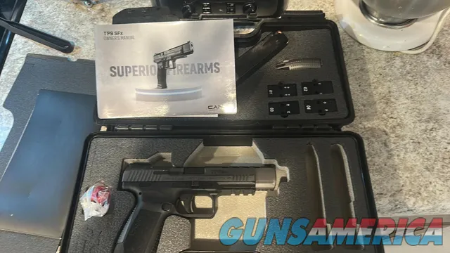 Canik TP9 SFx 9mm with case and optic pl...