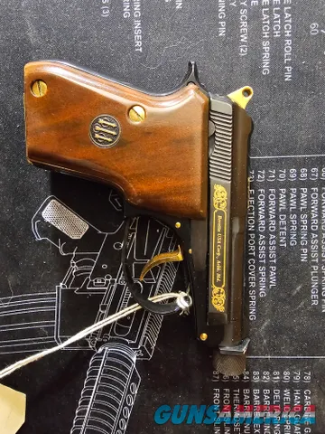 Beretta 21A Bobcat .22 LR with wood grip...