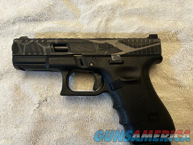 Glock 19 9mm with aftermarket SIP slide