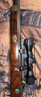 T/C Hawken percussion muzzleloader with scope and sling
