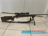 Bolt-Action Rifle with Scope, Bipod, and Sling