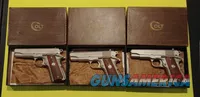 Three Colt Pistols