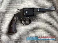 Colt Official Police .38 Special with Checkered Walnut Colt Medallion Grips