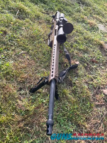 Barrett MRAD FDE bolt-action precision rifle with scope