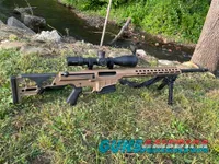 Barrett MRAD FDE bolt-action precision rifle with scope