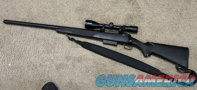 Bolt-Action Hunting Rifle with Scope and...